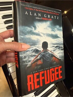 Refugee by Alan Gratz - Hardcover Novel in Black & Red